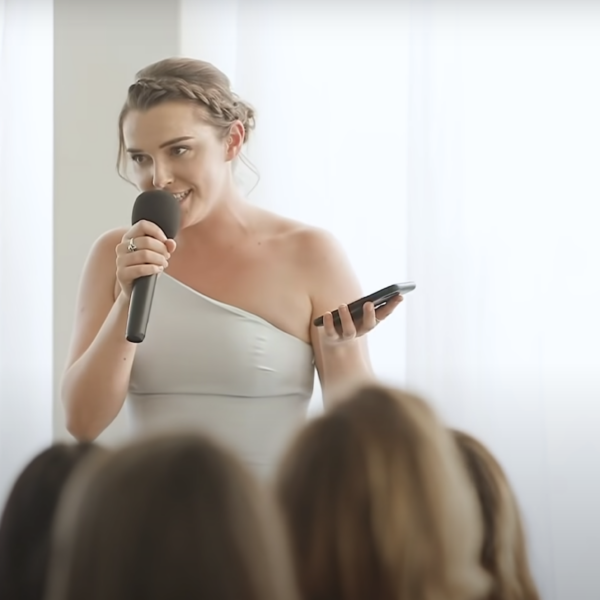 A maid of honour gives a funny speech for her sister.